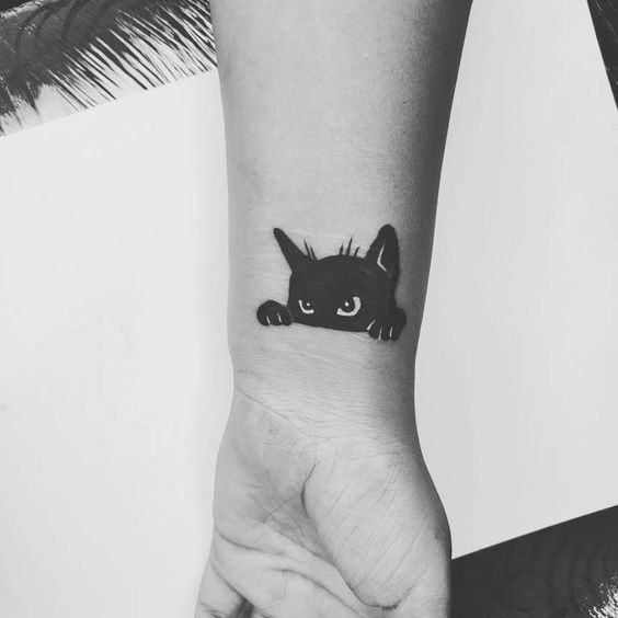 Black cat head tattoo