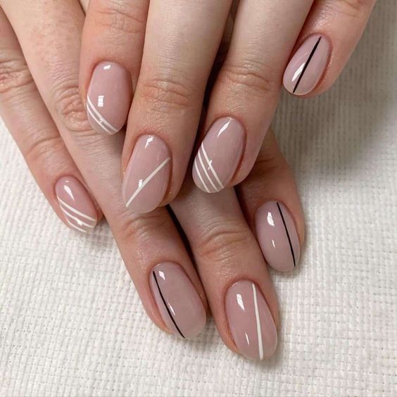 Cream manicure with Abstract Lines