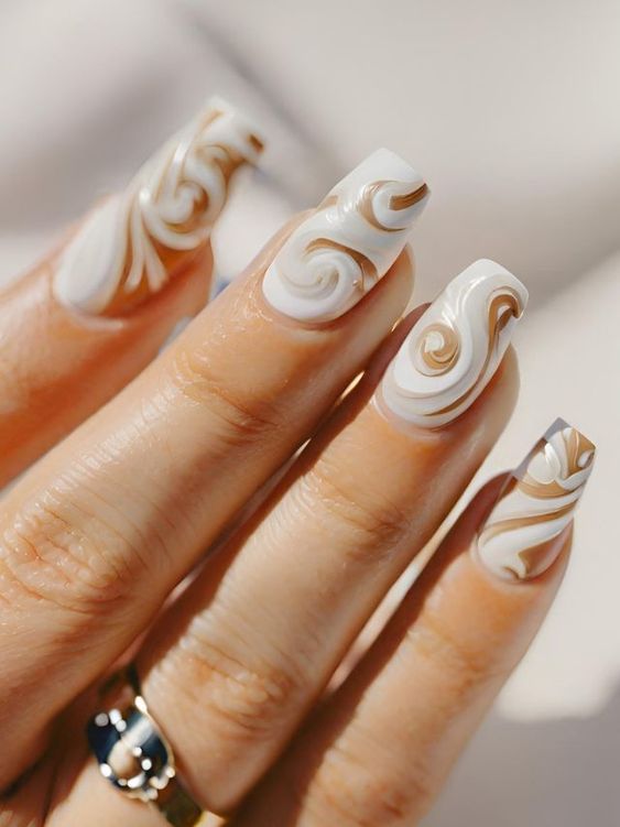 cream-colored swirls over a traditional white French base