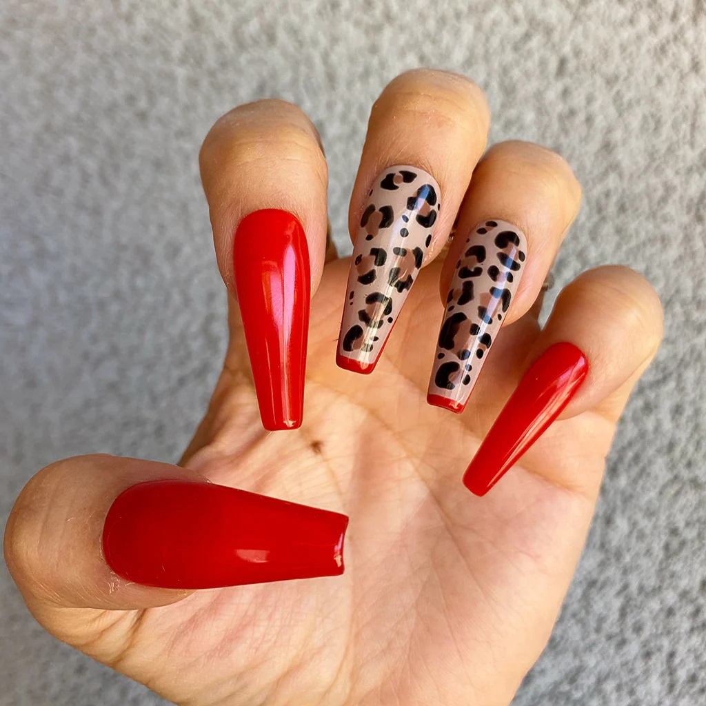 solid red and leopard print nails