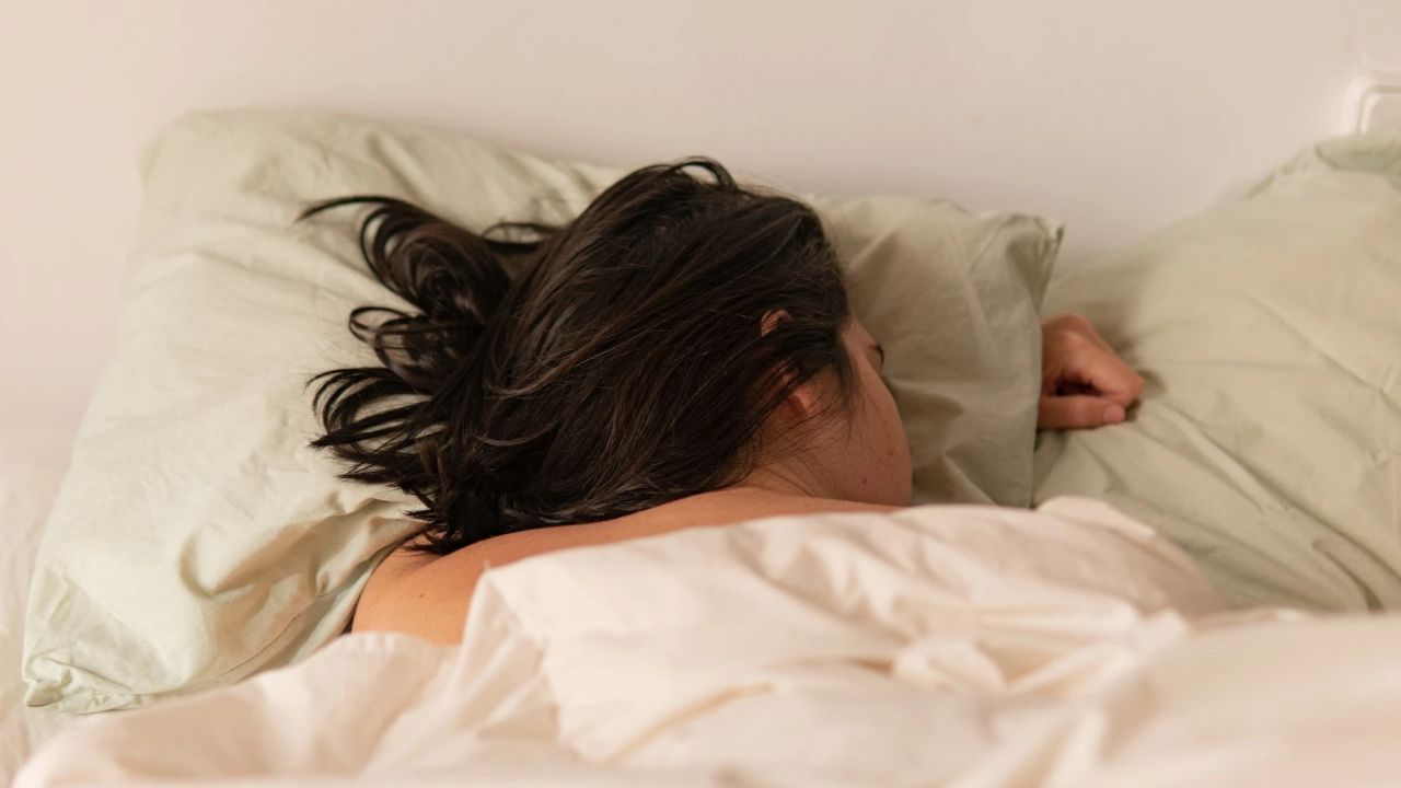 woman sleeping with wet hair